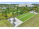 Community bocce ball court with manicured landscaping and seating areas at 29488 Ginnetto Dr, Wesley Chapel, FL 33543