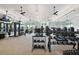 Bright gym with exercise equipment, weightlifting gear, and fans at 29488 Ginnetto Dr, Wesley Chapel, FL 33543