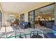 Comfortable lanai with views into the living area at 29488 Ginnetto Dr, Wesley Chapel, FL 33543