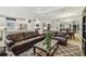 Bright open-concept living space, with a view of the kitchen and dining area at 29488 Ginnetto Dr, Wesley Chapel, FL 33543