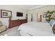 Comfortable main bedroom featuring an ensuite bathroom and spacious closet at 29488 Ginnetto Dr, Wesley Chapel, FL 33543