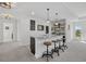 Entertain in this stylish bar with a granite counter, pendant lighting and space for seating at 33105 Kateland Dr, Wesley Chapel, FL 33545