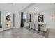 Inviting dining area featuring modern decor and plenty of natural light, perfect for gatherings at 33105 Kateland Dr, Wesley Chapel, FL 33545