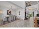Dining area with elegant chandelier, seating for six, and staircase to second level at 33105 Kateland Dr, Wesley Chapel, FL 33545