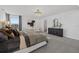 Bright main bedroom with lots of natural light, soft carpet and stylish décor at 33105 Kateland Dr, Wesley Chapel, FL 33545