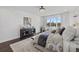 Serene main bedroom with a view, stylish furnishings, and hardwood floors at 33105 Kateland Dr, Wesley Chapel, FL 33545