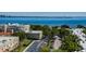 Aerial view highlighting the building, parking area, and waterfront views at 3325 Bayshore Blvd # D11, Tampa, FL 33629