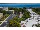 Expansive aerial view featuring the building, parking lot and waterfront at 3325 Bayshore Blvd # D11, Tampa, FL 33629