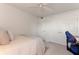 Inviting bedroom provides a dedicated workspace, ceiling fan, and an abundance of closet space at 3325 Bayshore Blvd # D11, Tampa, FL 33629