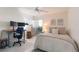 Inviting bedroom provides a dedicated workspace, ceiling fan, and an abundance of natural light at 3325 Bayshore Blvd # D11, Tampa, FL 33629