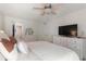 Comfortable bedroom with ceiling fan, neutral decor, white walls, and ample closet space at 3325 Bayshore Blvd # D11, Tampa, FL 33629
