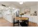 Eat-in kitchen featuring stainless appliances with a round dining table at 3325 Bayshore Blvd # D11, Tampa, FL 33629