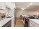 Modern kitchen with stainless steel appliances and a center island at 3325 Bayshore Blvd # D11, Tampa, FL 33629