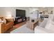 Bright living room shows an open floor plan with kitchen in the background and modern decor throughout at 3325 Bayshore Blvd # D11, Tampa, FL 33629