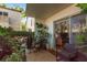 Inviting outdoor patio with lush greenery and a sliding glass door entrance at 3325 Bayshore Blvd # D11, Tampa, FL 33629