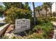 Bayshore Trace Condominium signage with well-maintained landscaping at 3325 Bayshore Blvd # D11, Tampa, FL 33629