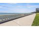 Beautiful waterfront view and paved walkway for pedestrians at 3325 Bayshore Blvd # D11, Tampa, FL 33629