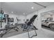 Home gym with treadmill, weights, and workout machines, all conveniently located inside the home at 3418 Overlook Ne Dr, St Petersburg, FL 33703