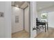 A view of an elevator inside the home with a desk and chairs in the background at 3418 Overlook Ne Dr, St Petersburg, FL 33703
