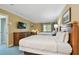 Bedroom with 2 beds, flat screen TV, and a dresser at 36750 Us 19 N # 06211, Palm Harbor, FL 34684