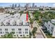 This modern multi-story townhouse offers a sleek exterior with stunning skyline views from the rooftop terrace at 401 N Oregon Ave # 1, Tampa, FL 33606