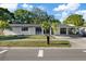 Charming single-story home with a covered carport and well-maintained front yard at 4105 W Iowa Ave, Tampa, FL 33616
