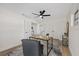 Cozy home office with ceiling fan, natural light, and stylish furnishings at 4105 W Iowa Ave, Tampa, FL 33616