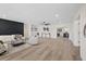 Spacious living room features modern decor, stylish furnishings, and recessed lighting at 4105 W Iowa Ave, Tampa, FL 33616