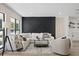 Spacious living room with modern accent wall and contemporary decor at 4105 W Iowa Ave, Tampa, FL 33616