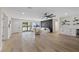 Inviting living room with hardwood floors, modern furnishings, and ample natural light at 4105 W Iowa Ave, Tampa, FL 33616