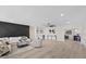 Open-concept living room flows to wet bar and dining area at 4105 W Iowa Ave, Tampa, FL 33616