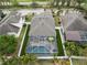 Aerial view of the fenced backyard featuring a pool and lanai, providing a private outdoor retreat at 513 Manns Harbor Dr, Apollo Beach, FL 33572