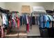 Spacious walk-in closet with shelving and hanging space for organized storage and easy access at 513 Manns Harbor Dr, Apollo Beach, FL 33572