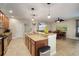Modern kitchen boasting stainless steel appliances and ample counter space at 513 Manns Harbor Dr, Apollo Beach, FL 33572