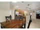 Bright kitchen featuring stainless appliances, ample cabinet space, and a breakfast bar for casual dining at 513 Manns Harbor Dr, Apollo Beach, FL 33572