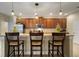 Bright kitchen with stainless steel appliances and granite countertops at 513 Manns Harbor Dr, Apollo Beach, FL 33572