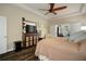 Well-appointed main bedroom boasting a ceiling fan and neutral wall colors at 513 Manns Harbor Dr, Apollo Beach, FL 33572