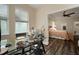 Home office with modern desk overlooking the main bedroom at 513 Manns Harbor Dr, Apollo Beach, FL 33572