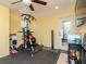 This room features an exercise machine, fan, and light, perfect for workouts and staying active at home at 5433 Palmetto Rd, New Port Richey, FL 34652