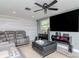 Contemporary living room showcasing sleek furniture, recessed lighting, and a stylish accent wall at 5433 Palmetto Rd, New Port Richey, FL 34652