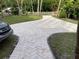 Long paved driveway leading to home and additional parking at 5706 River Terrace, Tampa, FL 33604