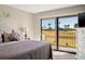 Bedroom features a sliding glass door with a golf course view at 6140 Sun Blvd # 5, St Petersburg, FL 33715