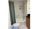 Clean bathroom with a combined shower and tub, a vanity with storage, and safety bars at 6201 2Nd E St # 89, St Pete Beach, FL 33706