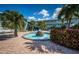 Water fountain with lush landscaping at 6201 2Nd E St # 89, St Pete Beach, FL 33706