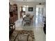 Inviting dining room with neutral colors and updated floors at 6201 2Nd E St # 89, St Pete Beach, FL 33706