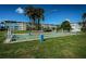 Recreational area featuring shuffleboard courts, set on a well-maintained lawn at 6201 2Nd E St # 89, St Pete Beach, FL 33706
