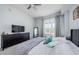 A well-lit bedroom with a queen bed, neutral paint, and modern decor provides a comfortable retreat at 700 S Harbour Island Blvd # 404, Tampa, FL 33602