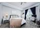 Comfortable bedroom featuring a large window for natural light and a dedicated workspace at 700 S Harbour Island Blvd # 404, Tampa, FL 33602
