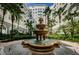 Elaborate fountain featured in community courtyard with lush plants at 700 S Harbour Island Blvd # 404, Tampa, FL 33602