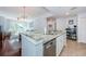 Open kitchen featuring granite countertops, stainless appliances, and a seamless view into the living area at 700 S Harbour Island Blvd # 404, Tampa, FL 33602